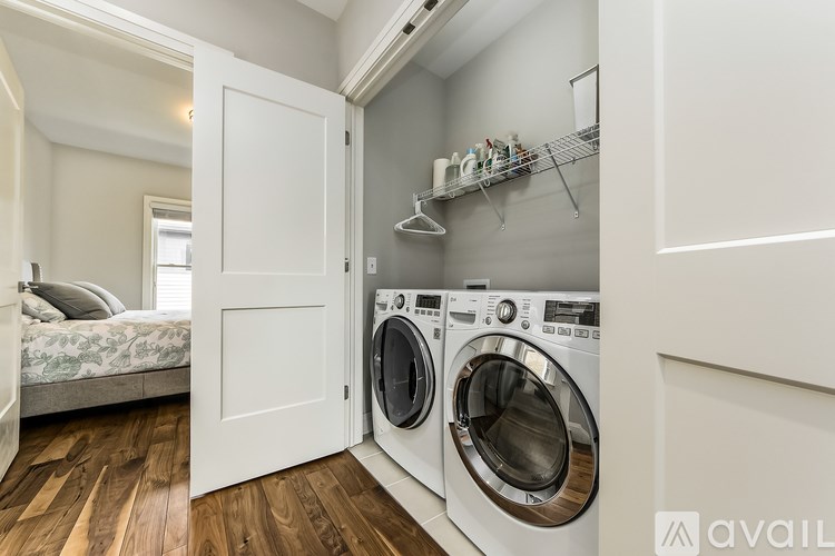 A laundry room with a washer and dryer.