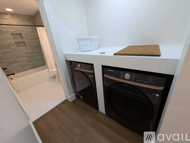 A laundry room with a washer and dryer.
