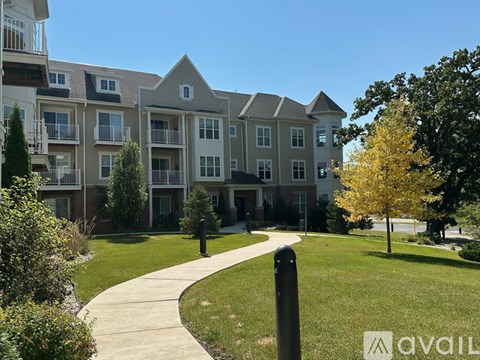 A building with a walkway in front of it.