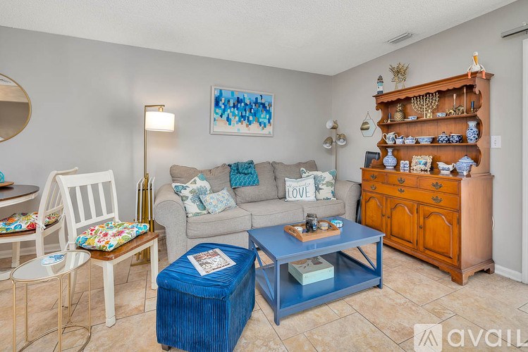 A blue door is on the left and a white door is on the right.