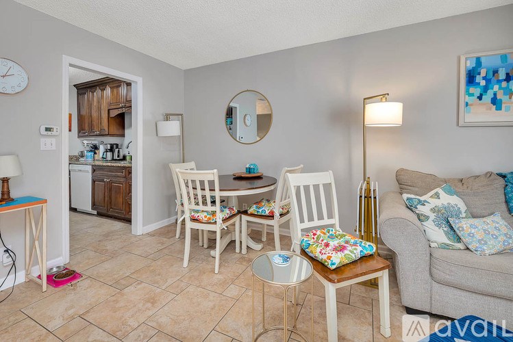A bathroom with a toilet and a shower.