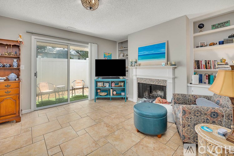 A gym with a variety of equipment including treadmills, stationary bikes, and weight machines.