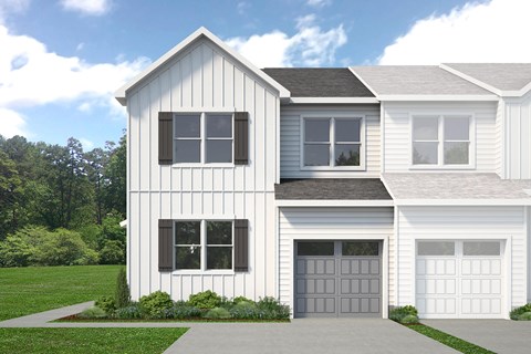 A two-story house with a white exterior and a grey garage door.
