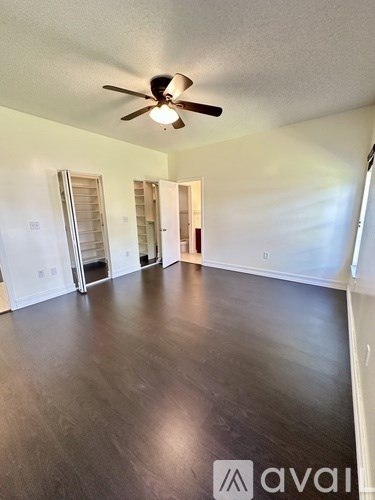 A shower curtain with the words "happy sunshine" written on it.