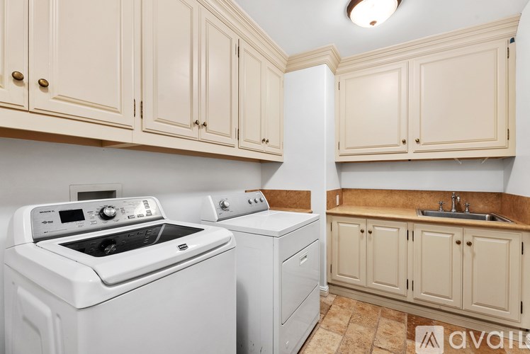 A doorway with a glass window in the middle of the room.