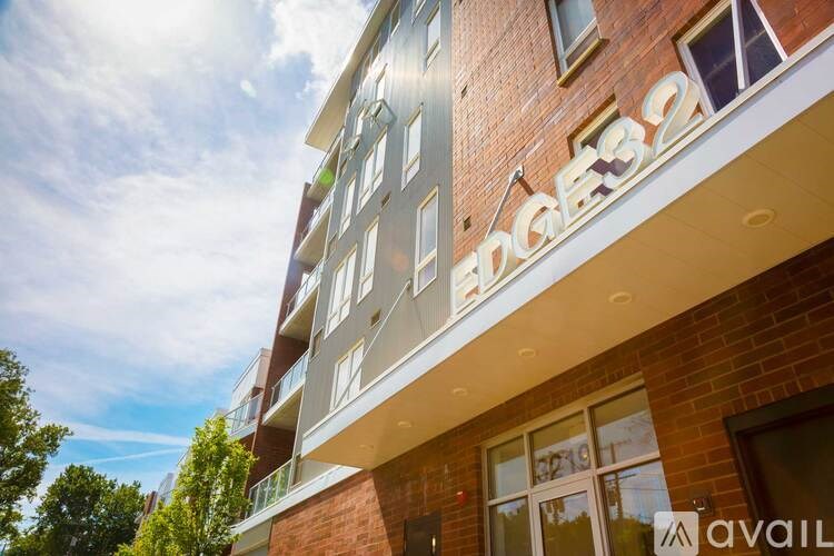 The image shows a building with the number 32 on it.