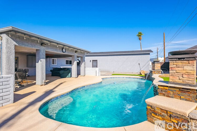 A house with a pool in the backyard.