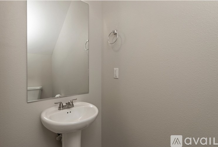 A bathroom sink with a mirror above it.