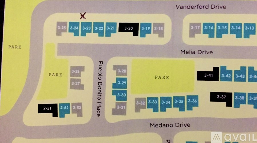Map of apartment buildings with a red X on it.