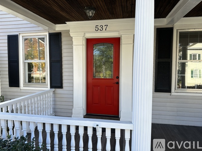 A house with the number 537 on the front door.