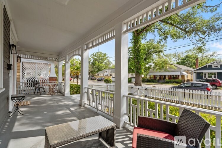 A patio with a table and chairs is shown.