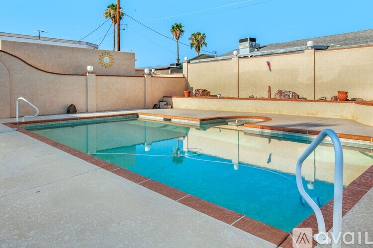 A pool with a glass divider in the middle.