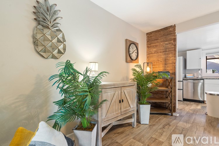 A kitchen with a sink and a window.