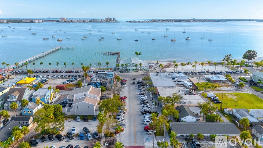 A living room with a grey couch and a television.