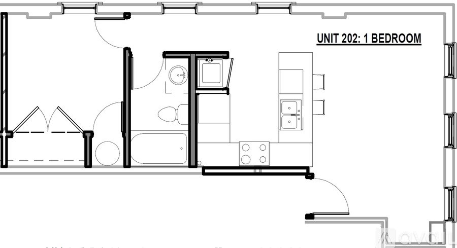 A black and white drawing of a bedroom layout.