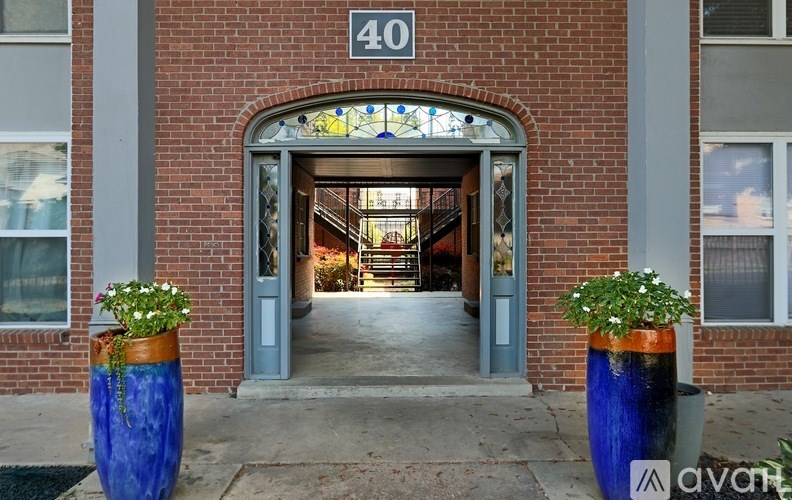 The entrance to a building with a number 40 on the wall.