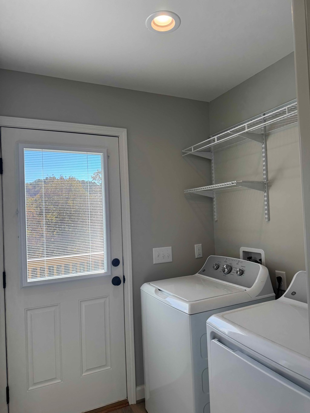A laundry room with a washer and dryer.