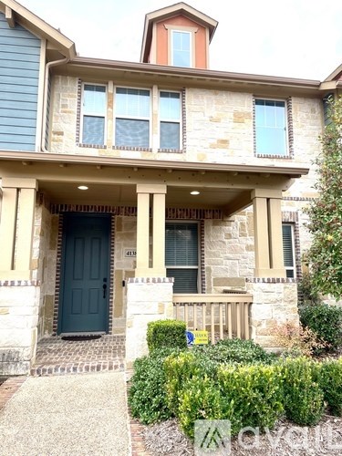 A house with a blue door and windows.