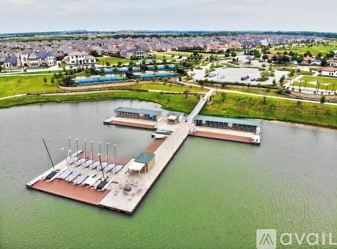 A large marina with boats and a dock.