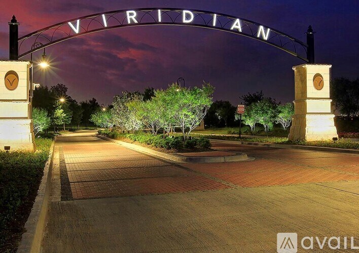 A night view of the Viridian entrance with lights on.
