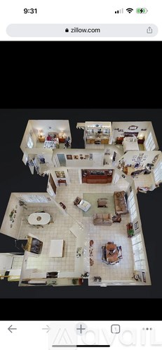 A 3D floor plan of a house with multiple rooms.