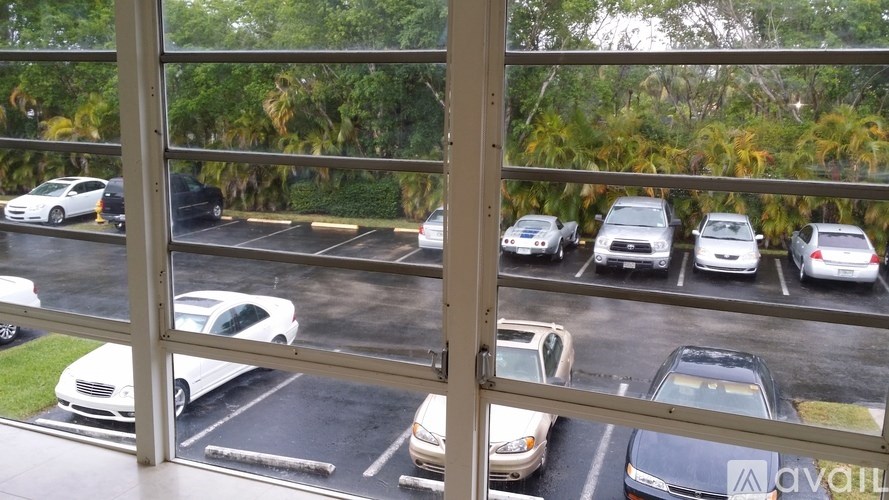 A parking lot with cars parked in it.