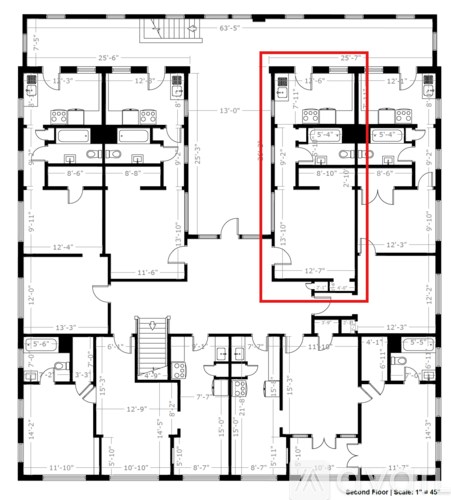 A floor plan of a building with rooms and dimensions.