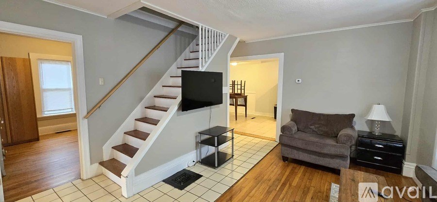 A white washing machine and dryer in a laundry room.