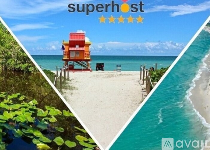 A beach scene with a lifeguard tower and a clear blue sky.
