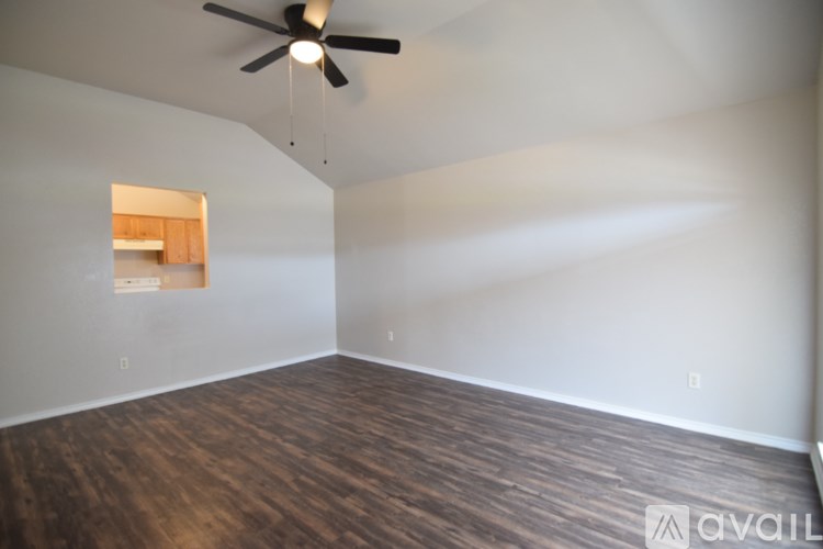 A room with a door and a window.