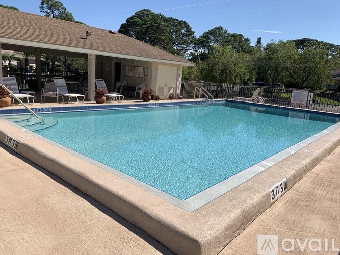 A swimming pool with the number 3173M on the side.