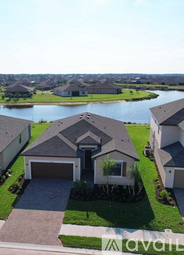 A house with a garage is for sale.