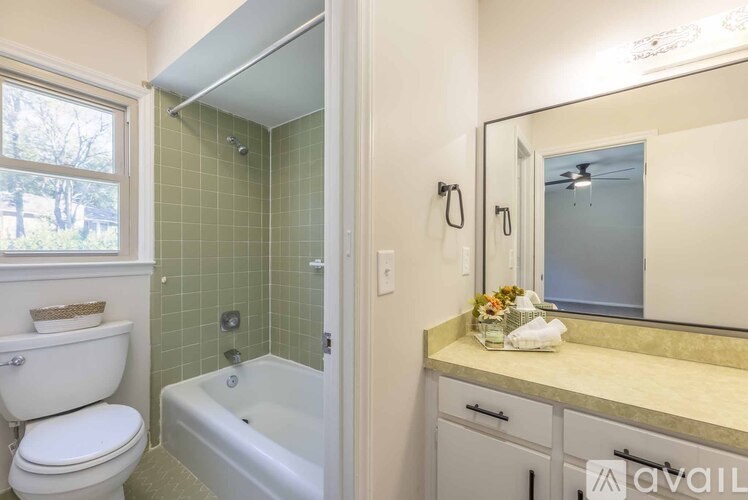 A color palette with four different colors including green, brown, and beige.