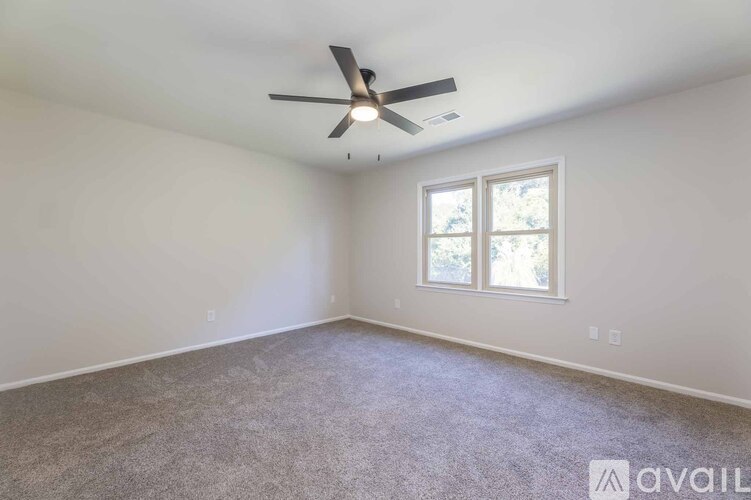A floor plan for a home with three bedrooms and two bathrooms.