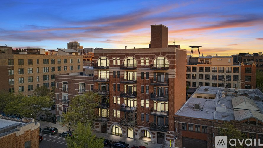 A building with a sign that says "available" in front of it.