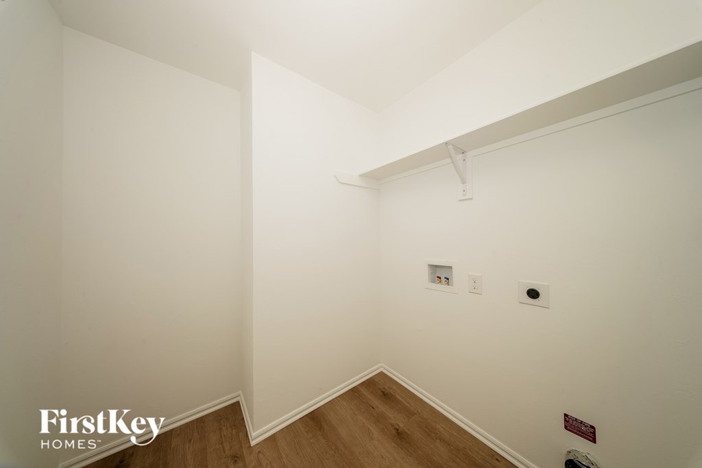 A white room with a FirstKey Homes logo.