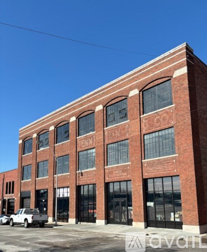 A brick building with the word Penn on the front.