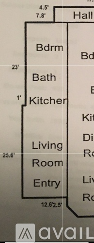 A diagram of a floor plan for a house with a living room, kitchen, bath, and bedrooms.