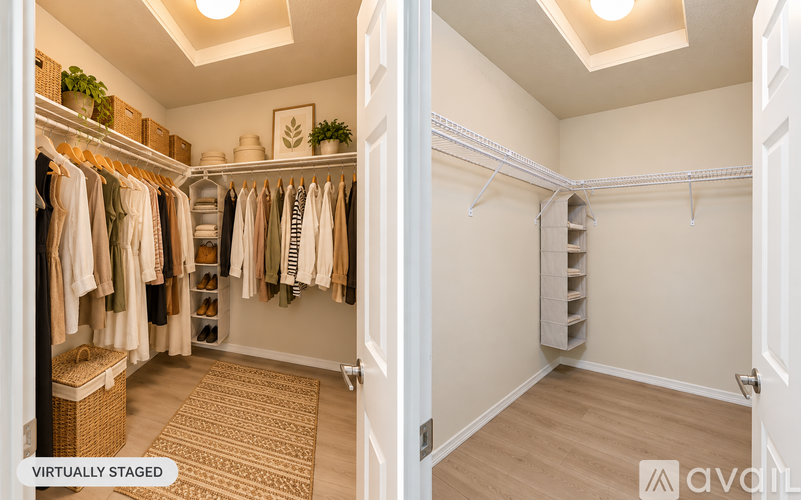 A well-lit, spacious bathroom with a large tub and double sink.