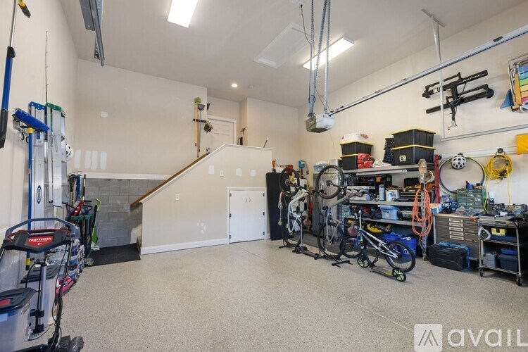 A garage with a variety of tools and equipment.