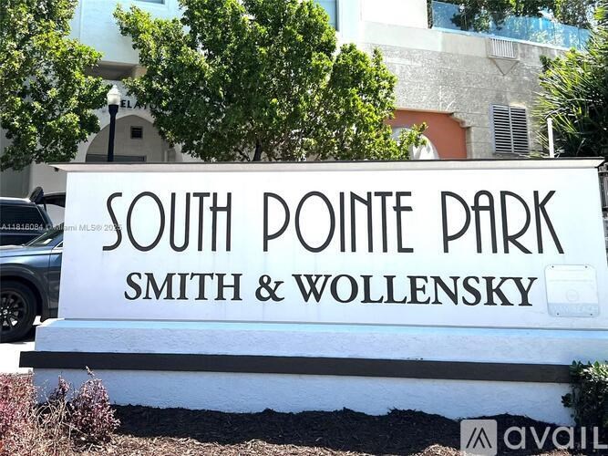 A sign for South Pointe Park by Smith & Wollensky.
