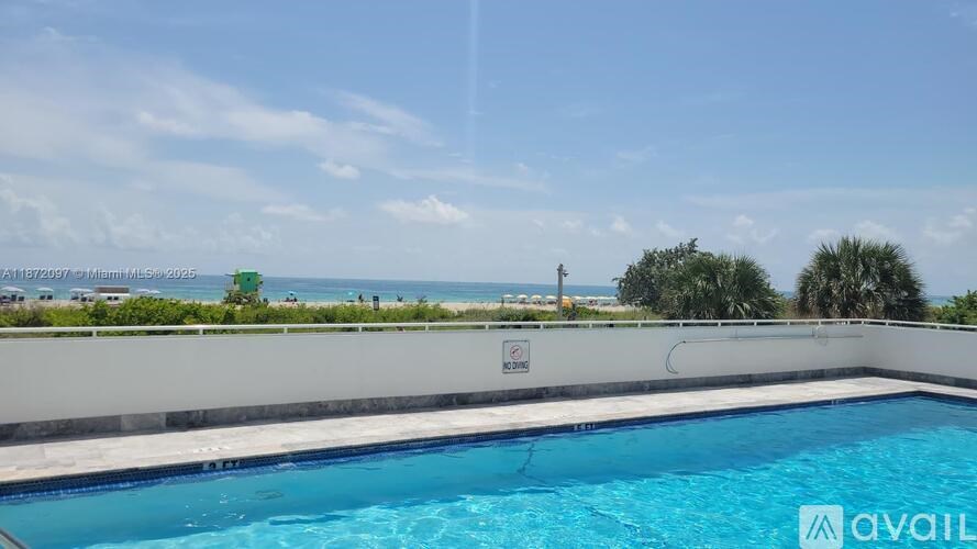 A pool with a sign that says "AVAILABLE" in the foreground.