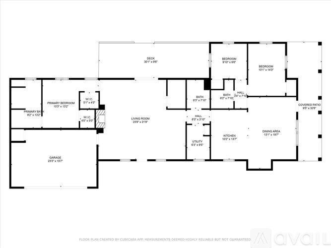 A floor plan for a house with a garage, living room, dining room, kitchen, and three bedrooms.