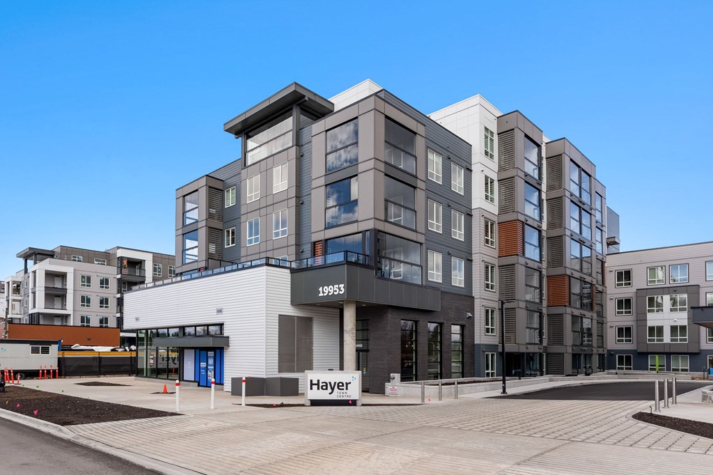 A modern building with the name "Hayer" on the front.