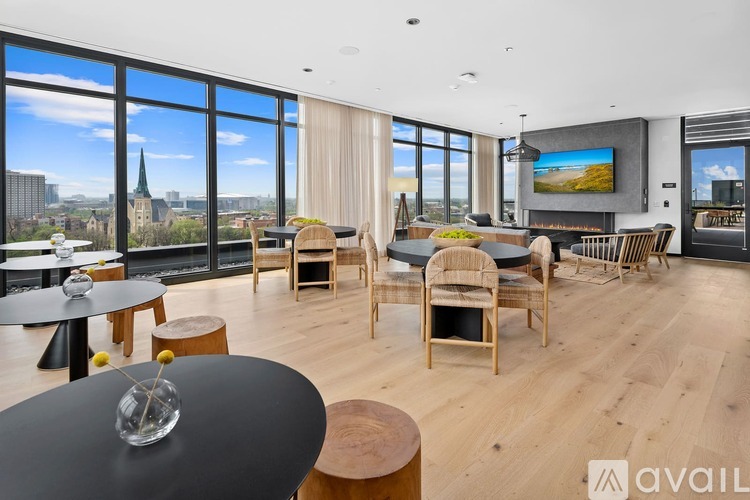 A modern living room with a view of the city skyline.