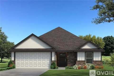 A house with a brown roof and a white garage door.