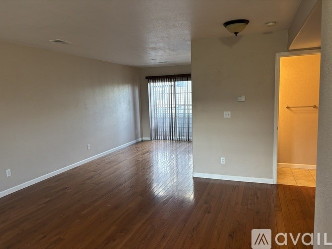 A row of houses with a sign that says "available" in front of them.