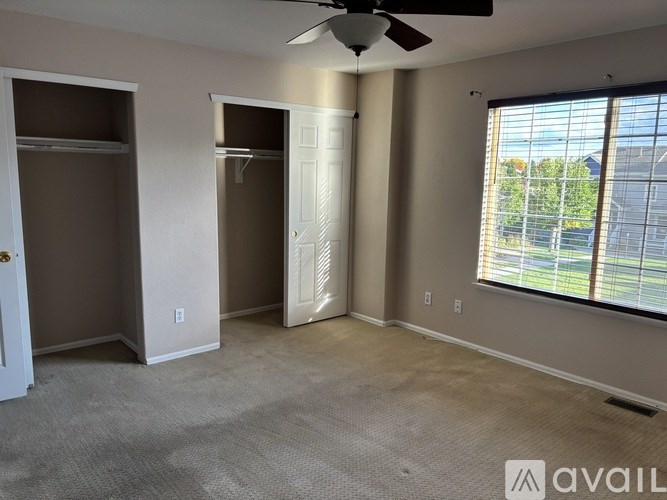 A kitchen with granite countertops and stainless steel appliances.
