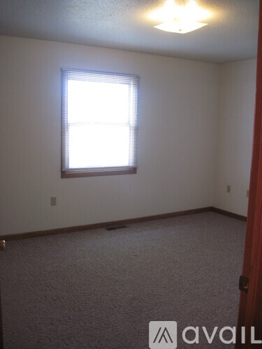 A room with a window and Avail logo.