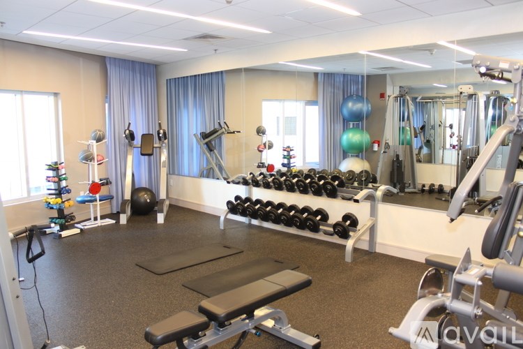 A well-equipped gym with a variety of exercise equipment.